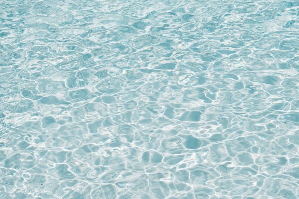 A blue and white water surface with ripples