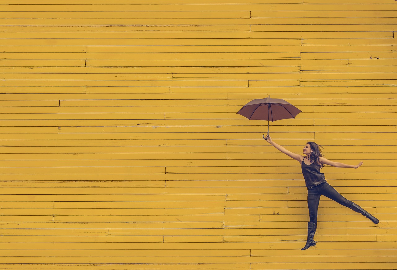 woman umbrella floating jumping 1245817