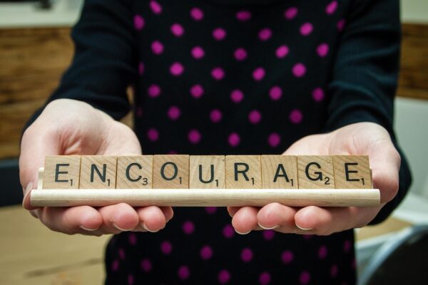 word encourage scrabble tiles 1940813