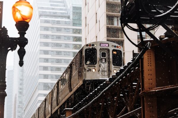 A train on a train track in the snow