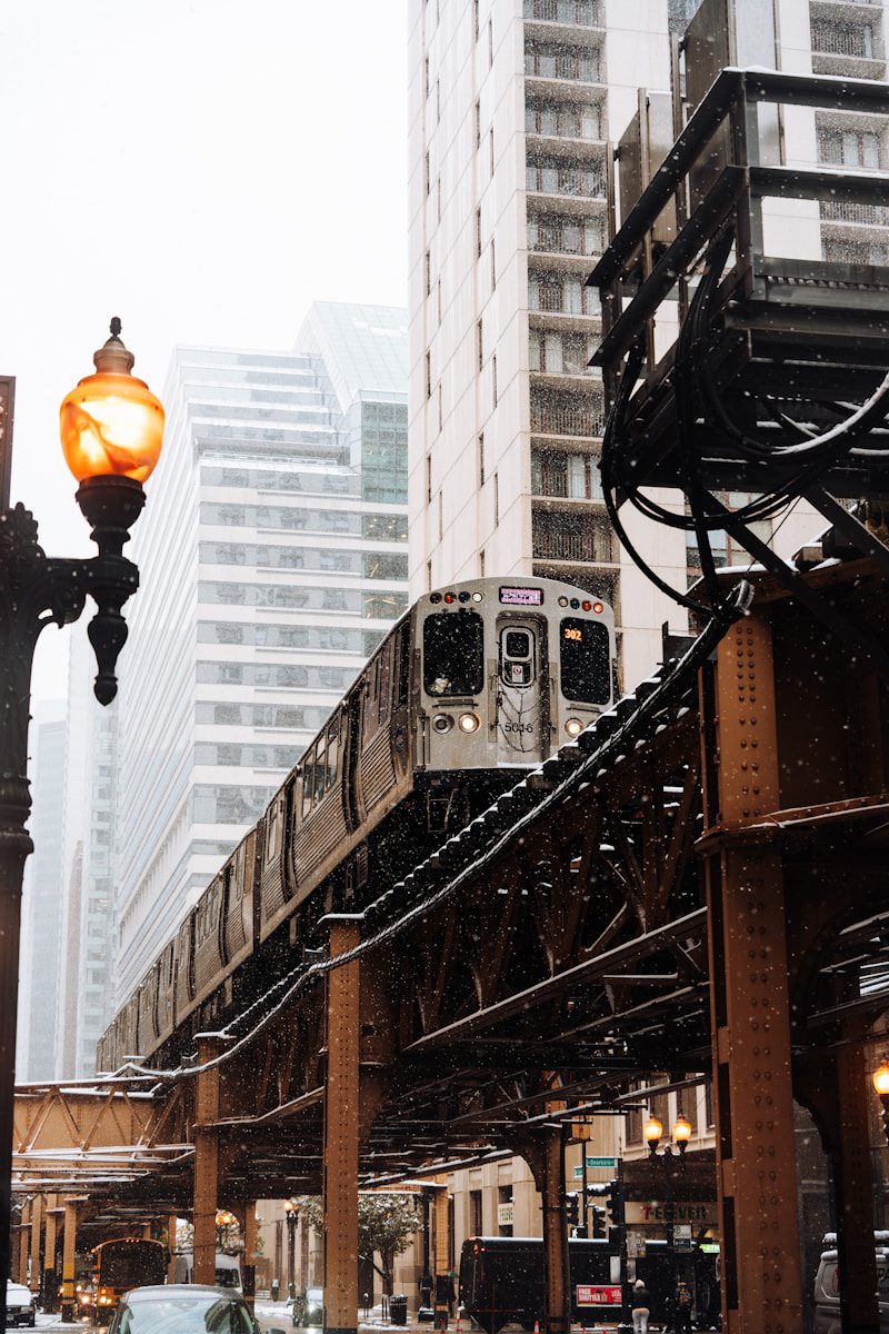 A train on a train track in the snow