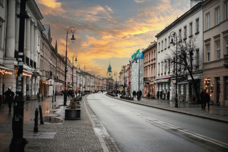 a city street with people walking on the sidewalks