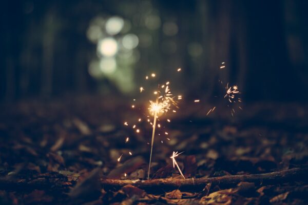 selective focus photography of sparklers