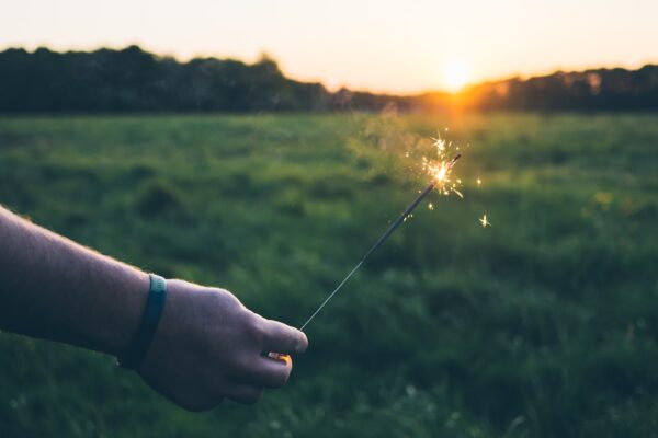 person holding fire stick