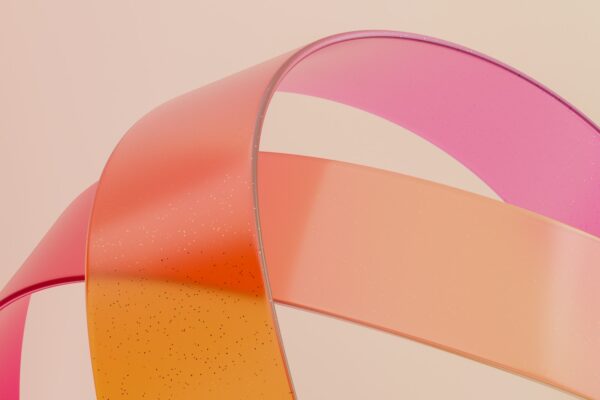 A close up of a pink and orange ribbon